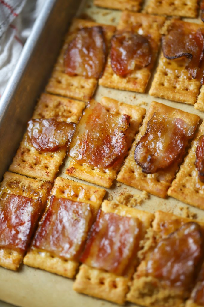 Make irresistible bacon crackers with bacon, brown sugar, a tiny bite of cayenne pepper and buttery crackers. Perfect for any gathering or snack time!