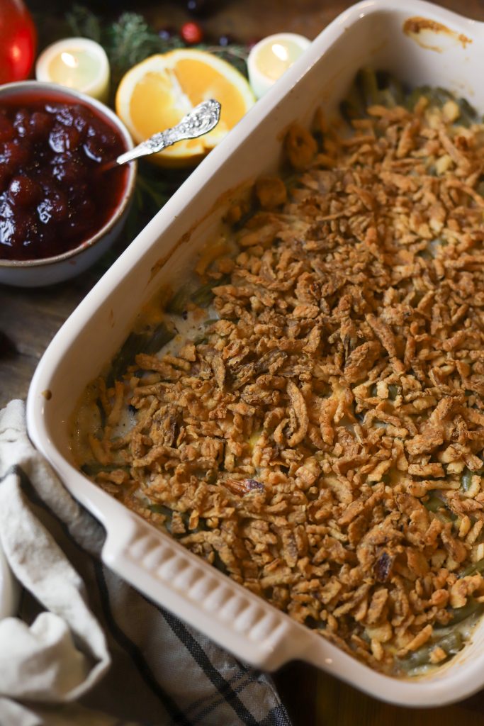 Enjoy a twist on the classic with this Cheesy Green Bean Casserole, perfect for any gathering with its savory cheese and rich ingredients.