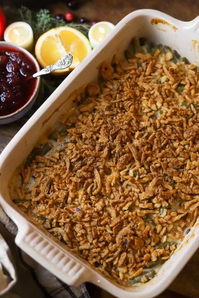 Enjoy a twist on the classic with this Cheesy Green Bean Casserole, perfect for any gathering with its savory cheese and rich ingredients.