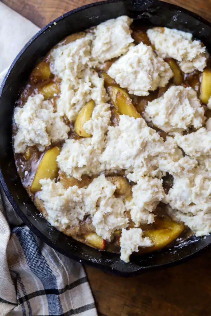 Ok. This apple cobbler with biscuit topping. This is my favorite biscuit recipe on top of a brown sugar, cinnamon fried apple filling. This is so decadent and fluffy. You have to top with vanilla ice cream while it's hot. You cannot beat this classic southern dessert.