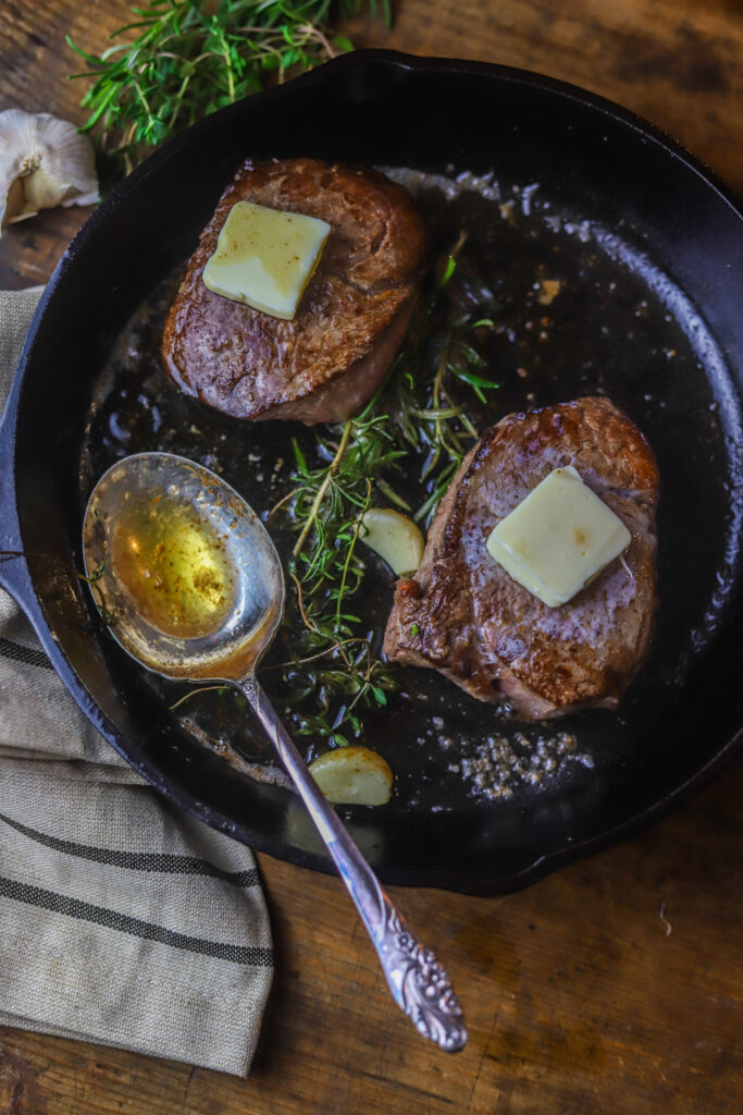 Can't beat an easy cast iron filet mignon. Takes less than 15 minutes to make them. You'll sear them super hot then add butter, garlic and a mix of herbs, pop them in the oven until your desired temp. They are so perfectly delicious, and seriously one of the easiest and quickest things to make.