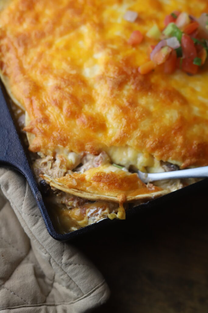 Call it whatever you want, but this easy Mexican chicken casserole with tortillas layered throughout is the bomb. Some may call this recipe chicken tortilla casserole or a chicken burrito casserole. Whatever you want to call it, this is such a great weeknight dinner. Simple, easy, and you can make it in about an hour.