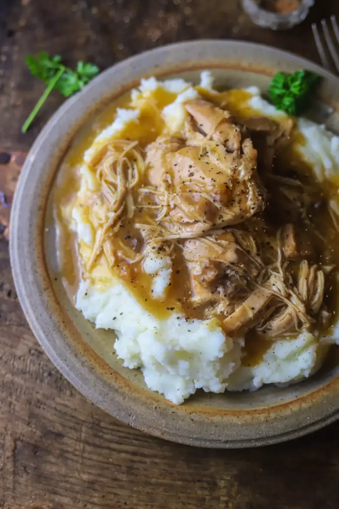 Ok. This simple crockpot chicken and gravy. This is the best comfort meal that literally requires hardly any effort. Throw some chicken breasts, a can of cream of chicken soup, chicken broth and a few gravy packets in the crockpot. Slow cook for about five hours. This meal is so simple and so delicious, you really cant beat it...