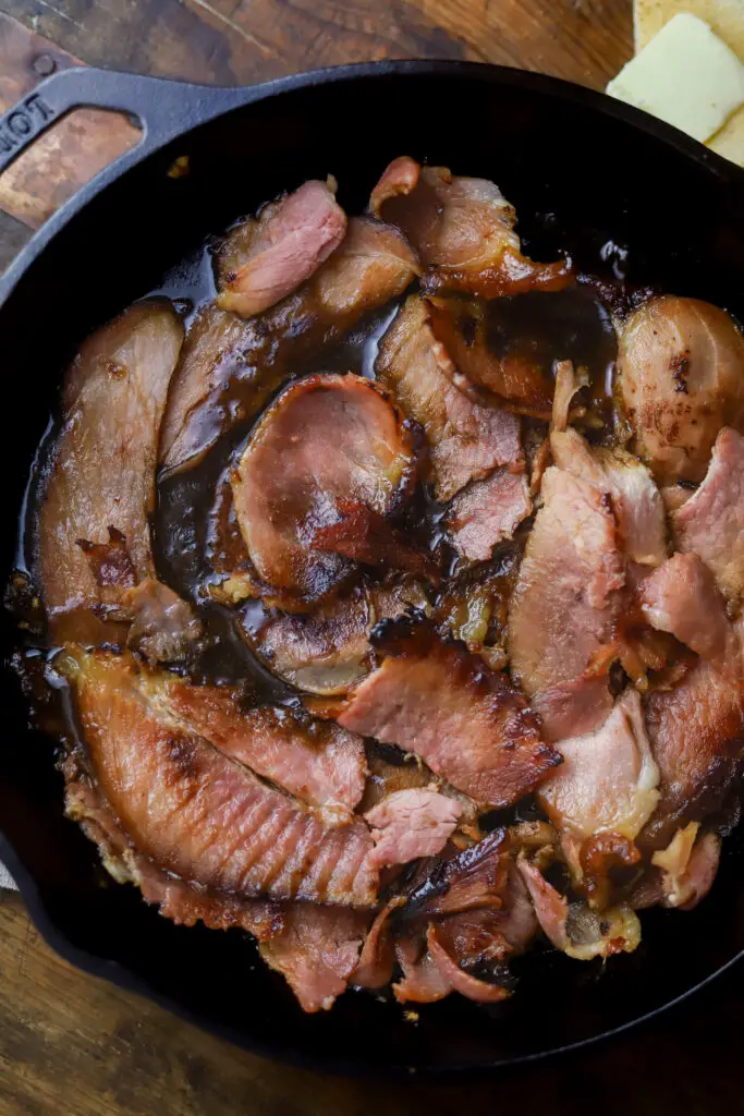 I love this country ham and red eye gravy. This is recipe where you use fatty slices of ham, cook them down to render the fat, then pout a cup of coffee in the skillet and a few seasonings to make a dark and rich gravy. This is a classic southern recipe and it's perfect when you're looking for recipes with leftover ham.