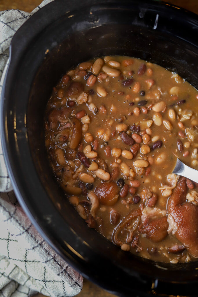 Call it soup or call it just beans, this 15 bean soup with ham is so simple and delicious. This recipe technically a soup or just a crockpot full of beans. You buy the bag of 15 beans from the grocery store. Put them in the crockpot with some ham hock and plenty of broth and water. Cook on low for about 8 hours. These beans are amazing and so simple to make. 