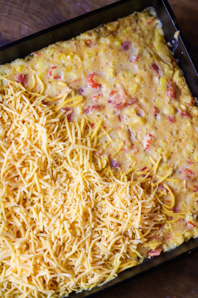 This Jiffy corn casserole with cheese and crawfish recipe is an easy and delicious recipe. It has only a few ingredients and is perfect when you need a comfort food idea quickly! When all the ingredients are combined, bake for about 45 to 50 minutes then top with cheese. So easy and the perfect side for any occasion.