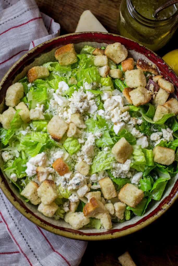 I love this sensation salad. Popular here in Louisiana, it's a simple mix of romaine lettuce, a mix of parmesan and other cheeses, and a lemon and olive oil salad dressing. Add in some croutons for some crunch. It's simplicity at its best, and you'll definitely want to try it.