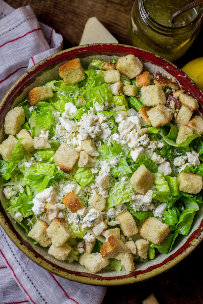 I love this sensation salad. Popular here in Louisiana, it's a simple mix of romaine lettuce, a mix of parmesan and other cheeses, and a lemon and olive oil salad dressing. Add in some croutons for some crunch. It's simplicity at its best, and you'll definitely want to try it.