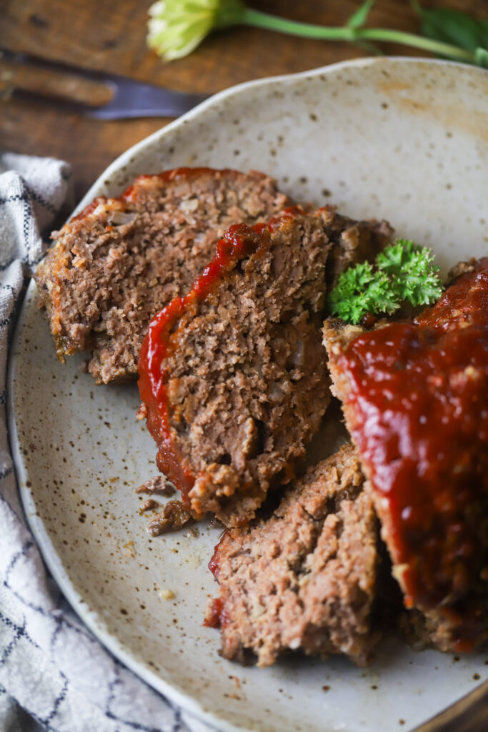 I love this easy crockpot meatloaf. This is nothing more than a traditional meatloaf recipe slow cooked all. You'll prepare the meatloaf just as you normally would, then line several sheets of foil in your slow cooker, place the loaf inside and slow cook on loaf for up to 6 hours. This recipe comes out so tender, juicy and delicious.