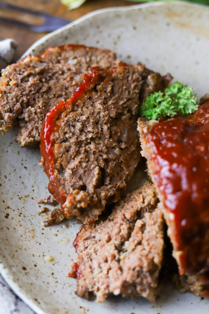 I love this easy crockpot meatloaf. This is nothing more than a traditional meatloaf recipe slow cooked all. You'll prepare the meatloaf just as you normally would, then line several sheets of foil in your slow cooker, place the loaf inside and slow cook on loaf for up to 6 hours. This recipe comes out so tender, juicy and delicious.