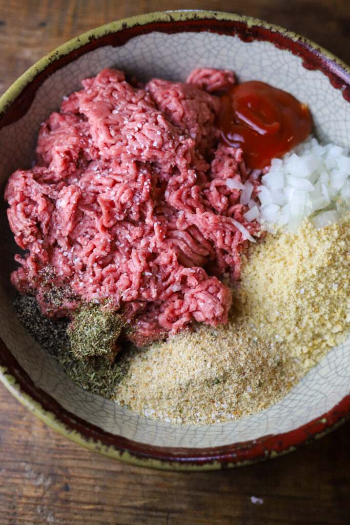 I love this easy crockpot meatloaf. This is nothing more than a traditional meatloaf recipe slow cooked all. You'll prepare the meatloaf just as you normally would, then line several sheets of foil in your slow cooker, place the loaf inside and slow cook on loaf for up to 6 hours. This recipe comes out so tender, juicy and delicious.