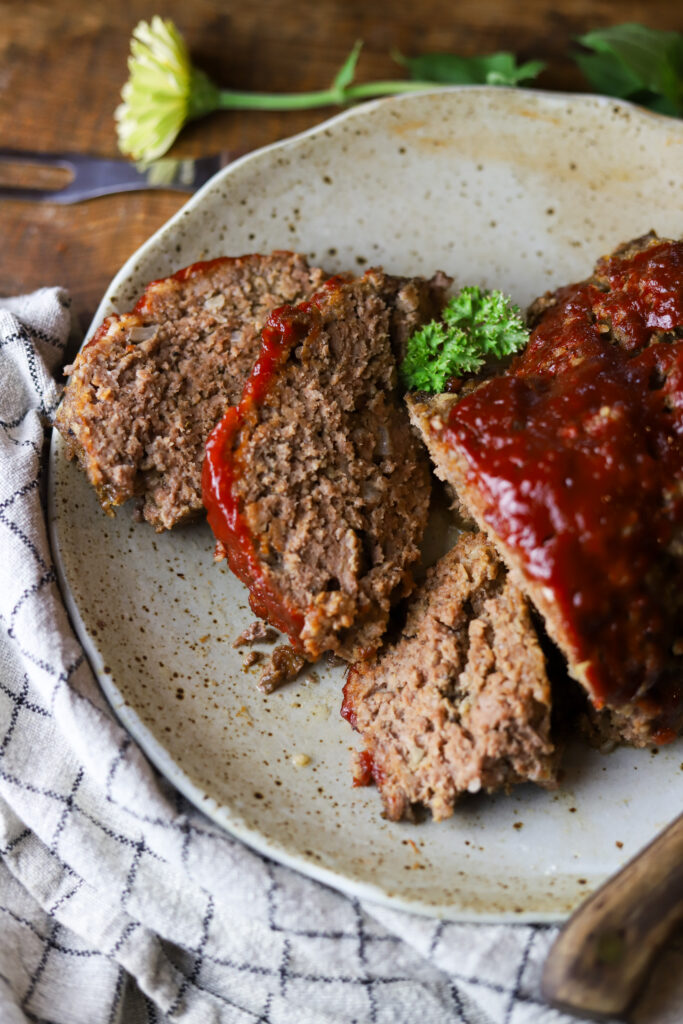 I love this easy crockpot meatloaf. This is nothing more than a traditional meatloaf recipe slow cooked all. You'll prepare the meatloaf just as you normally would, then line several sheets of foil in your slow cooker, place the loaf inside and slow cook on loaf for up to 6 hours. This recipe comes out so tender, juicy and delicious.