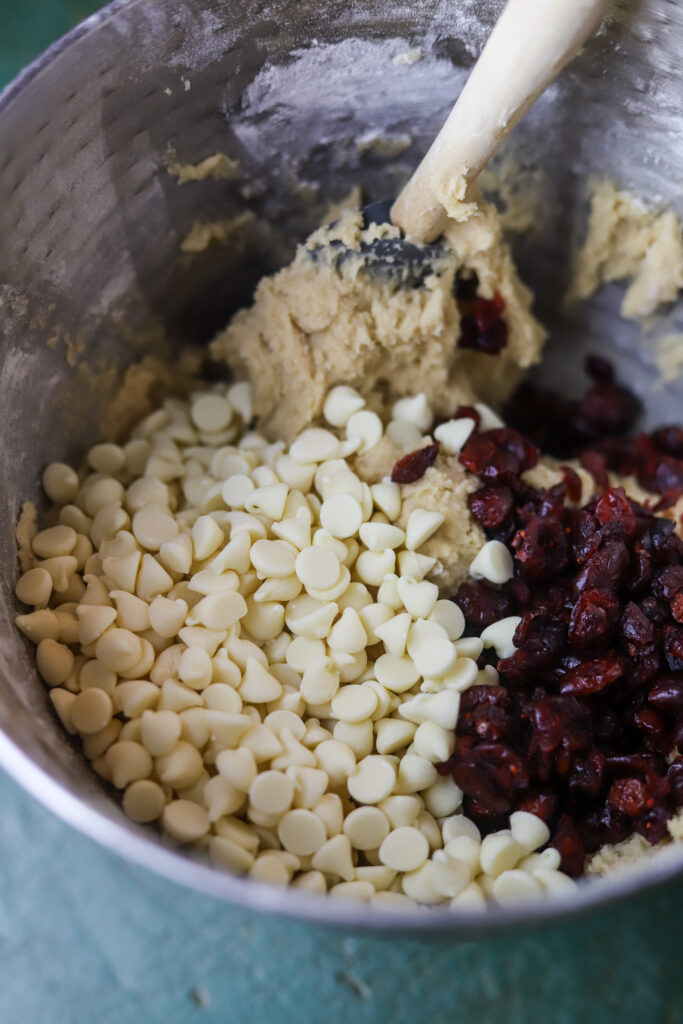 These white chocolate cranberry cookies are so perfect and delicious. These are made just like a traditional chocolate chip cookie, but they are full of white chocolate chips and dried cranberries. These are so chewy and delicious and perfect for any occasion.