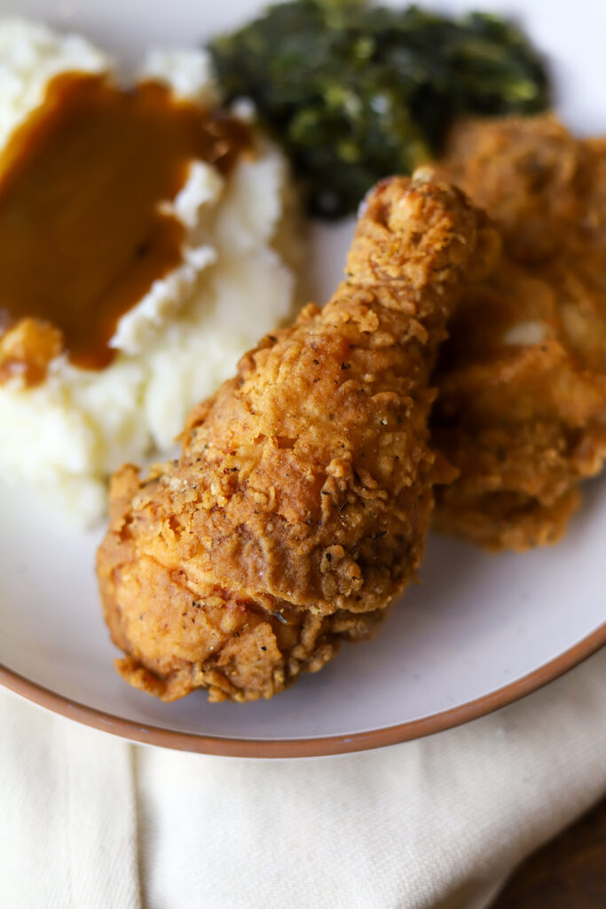 These are seriously the best fried chicken legs. Frying chicken does not have to be that complicated. I fry my chicken the old-fashioned way, in a big, Dutch oven. All you need for this recipe some chicken legs, a good breading, some old and a little patience. These come out perfectly crispy and juicy on the inside.