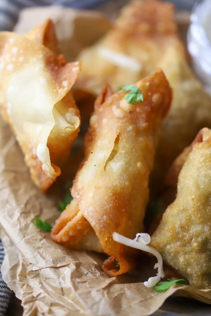 These Louisiana boudin egg rolls with pepper jack cheese are so amazingly delicious. Ok. This is kind of a cheat recipe. I used storebought boudin sausage and removed it from the casing. I added in few other things to bring it all together with some shredded pepper jack cheese, folded them up and fried. These have that perfect Louisiana boudin taste added with the cheesy pepper jack. I'm telling you; these cannot be beat.