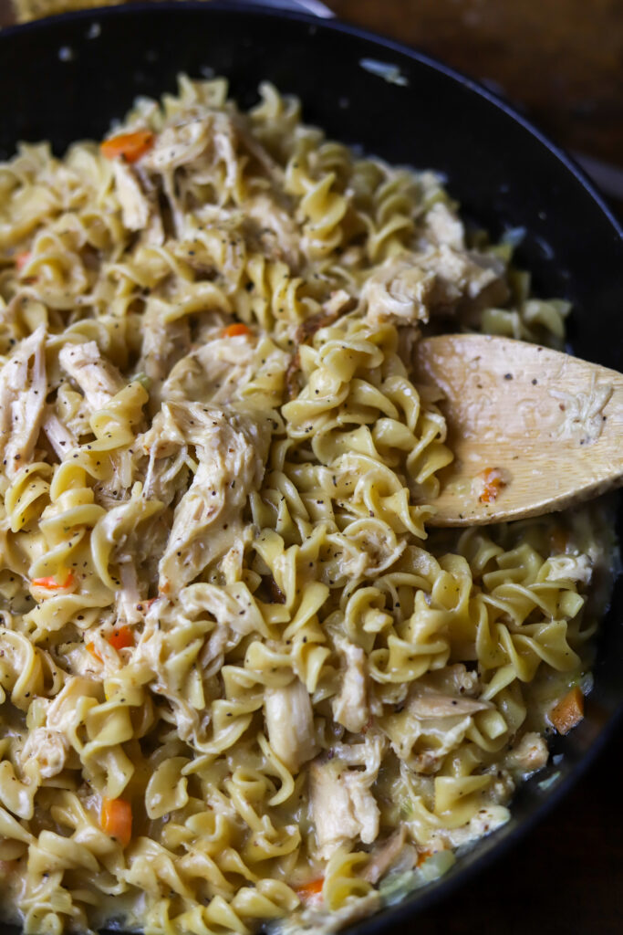 I love this old fashioned chicken and noodles recipe. My mom and my grandmother both used to make this all the time. For my recipe, I used rotisserie chicken, a homemade cream of chicken soup and some egg noodles. Once you cook it all down, it makes a nice creamy, one-pot meal. I’m telling you; you’ll love this comfort food favorite.