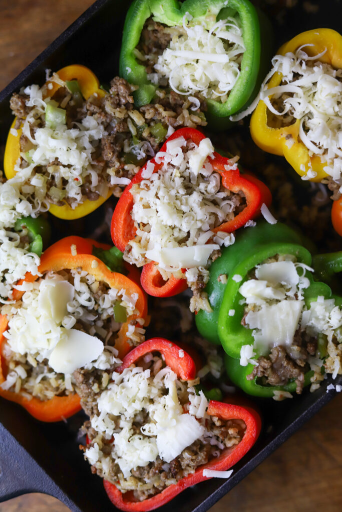 These dirty rice stuffed peppers are a perfect comfort meal. You can't beat a Louisiana dirty rice stuffed into sweet bell peppers. I added some Monterrey and Pepper Jack cheeses for added flavor. This is an amazingly delicious twist on a traditional stuffed pepper recipe. 