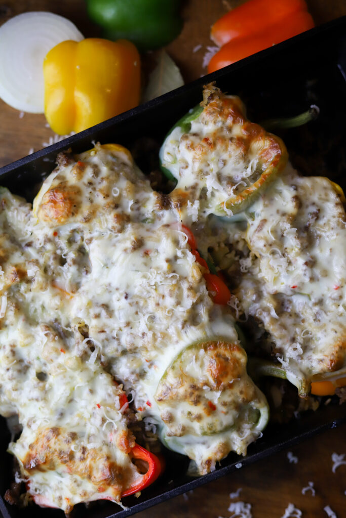 These dirty rice stuffed peppers are a perfect comfort meal. You can't beat a Louisiana dirty rice stuffed into sweet bell peppers. I added some Monterrey and Pepper Jack cheeses for added flavor. This is an amazingly delicious twist on a traditional stuffed pepper recipe. 