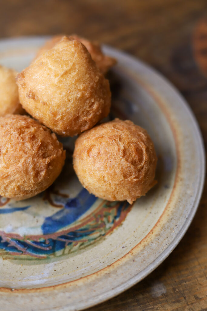 These deep fried cake bites are seriously what dreams are made of. Kind of like a funnel cake, you’ll take a box of cake mix and prepare it accordingly. Add in more flour then take a cookie scoop and drop it in some hot oil until nice and golden. Serve warm with any of your favorite toppings. These are seriously the bomb. 