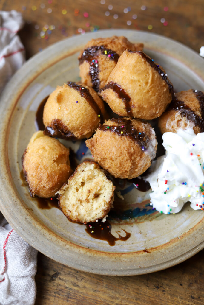 These deep fried cake bites are seriously what dreams are made of. Kind of like a funnel cake, you’ll take a box of cake mix and prepare it accordingly. Add in more flour then take a cookie scoop and drop it in some hot oil until nice and golden. Serve warm with any of your favorite toppings. These are seriously the bomb. 