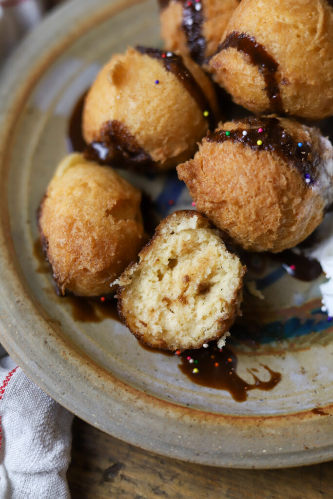 These deep fried cake bites are seriously what dreams are made of. Kind of like a funnel cake, you’ll take a box of cake mix and prepare it accordingly. Add in more flour then take a cookie scoop and drop it in some hot oil until nice and golden. Serve warm with any of your favorite toppings. These are seriously the bomb. 