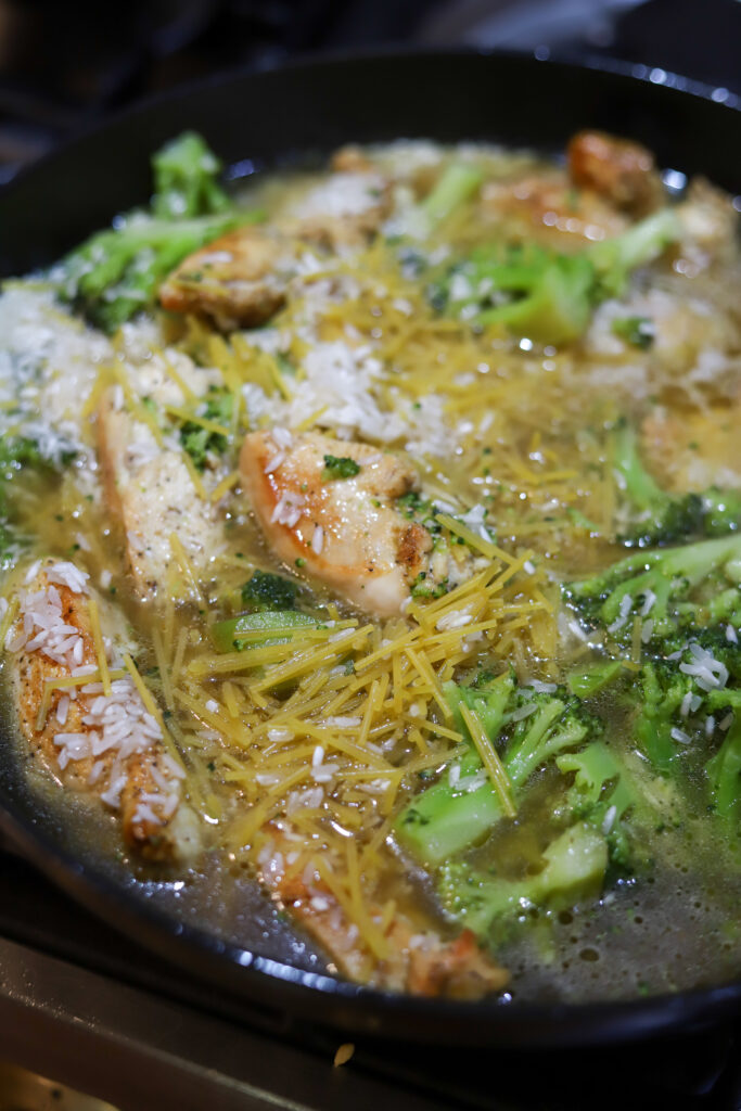 This homemade rice a roni chicken broccoli cheese casserole is an amazing one pot dinner. It’s sautéed chicken and broccoli cooked with rice, broken spaghetti noodles in a creamy cheese sauce. If you love all things broccoli cheddar, this is an easy dinner meal for you. 