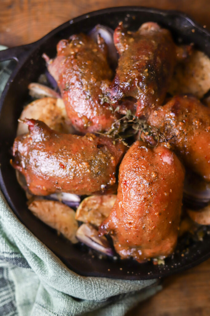 This sweet and sour wild roasted duck is a great recipe for fall and winter. If you are a duck hunter, you need to keep reading. This is simple recipe that can be made with any type of duck. It’s a simple slow roasted duck recipe, then once the ducks finish roasting, you’ll brush it with this amazingly delicious homemade sweet and sour sauce and crank the oven up to let the exterior crisp. I roasted them on top of apples and greens, which then later marinade and render in all the delicious duck fat. If you hunt and cook wild duck, you’ll definitely want to try this recipe. 