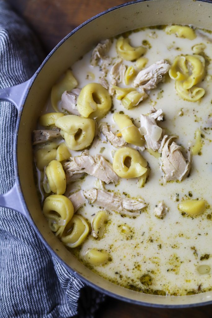 Enjoy a comforting creamy chicken tortellini soup, perfect for busy nights with its simple preparation and hearty ingredients.