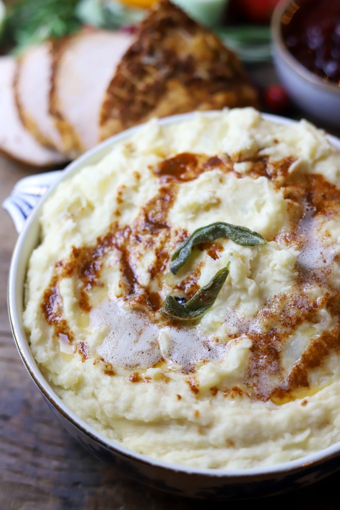 Discover the ultimate comfort food with these creamy brown butter mashed potatoes, an ideal side dish for any festive gathering.