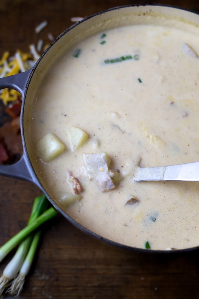 Indulge in our creamy Loaded Baked Potato Soup, featuring bacon, cheddar, and sour cream for a comforting meal ready in under 30 minutes.