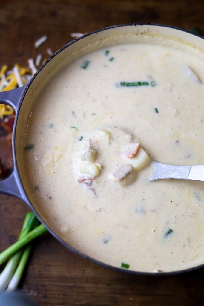 Indulge in our creamy Loaded Baked Potato Soup, featuring bacon, cheddar, and sour cream for a comforting meal ready in under 30 minutes.