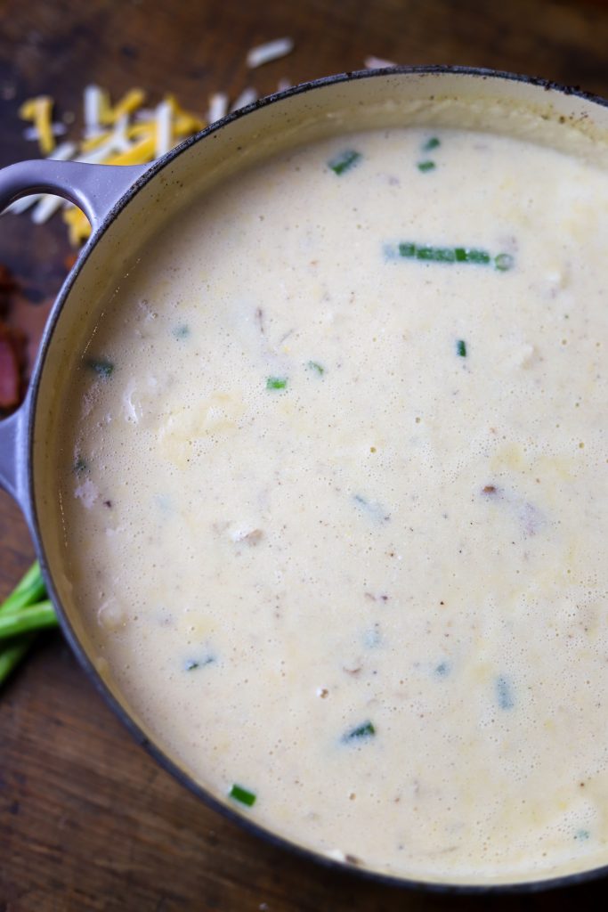 Indulge in our creamy Loaded Baked Potato Soup, featuring bacon, cheddar, and sour cream for a comforting meal ready in under 30 minutes.