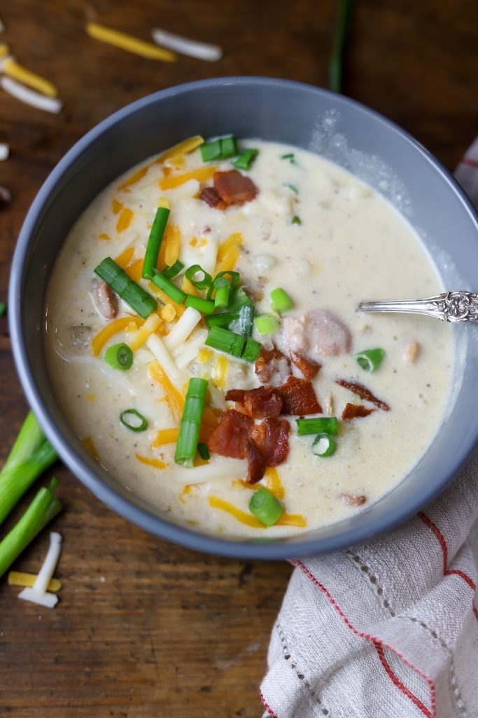 Indulge in our creamy Loaded Baked Potato Soup, featuring bacon, cheddar, and sour cream for a comforting meal ready in under 30 minutes.